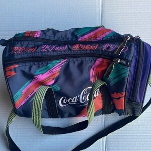 Coca Cola 90s Vibrant Small Duffel Bag with Red and Green Accents